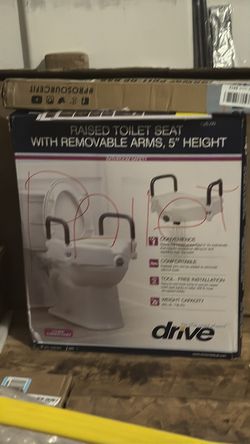 Raised toilet seat