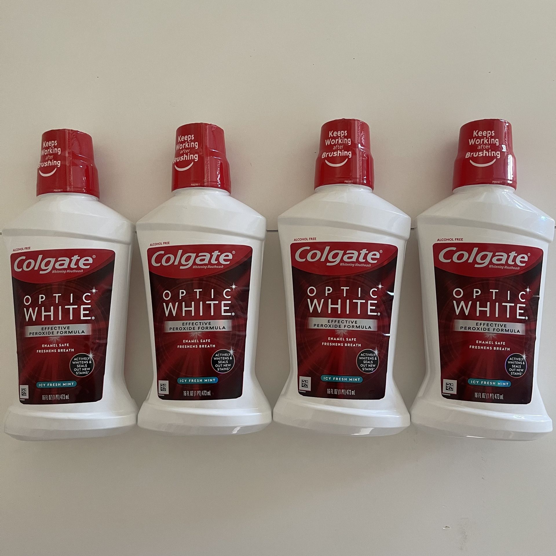 Colgate Optic White Whitening Adult Mouthwash, Fresh Mint 16oz , (4) bottles for $5