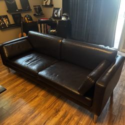 Brown faux leather couch