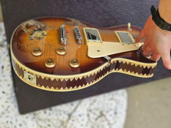 Les Paul Style guitar with inlays.  Unique