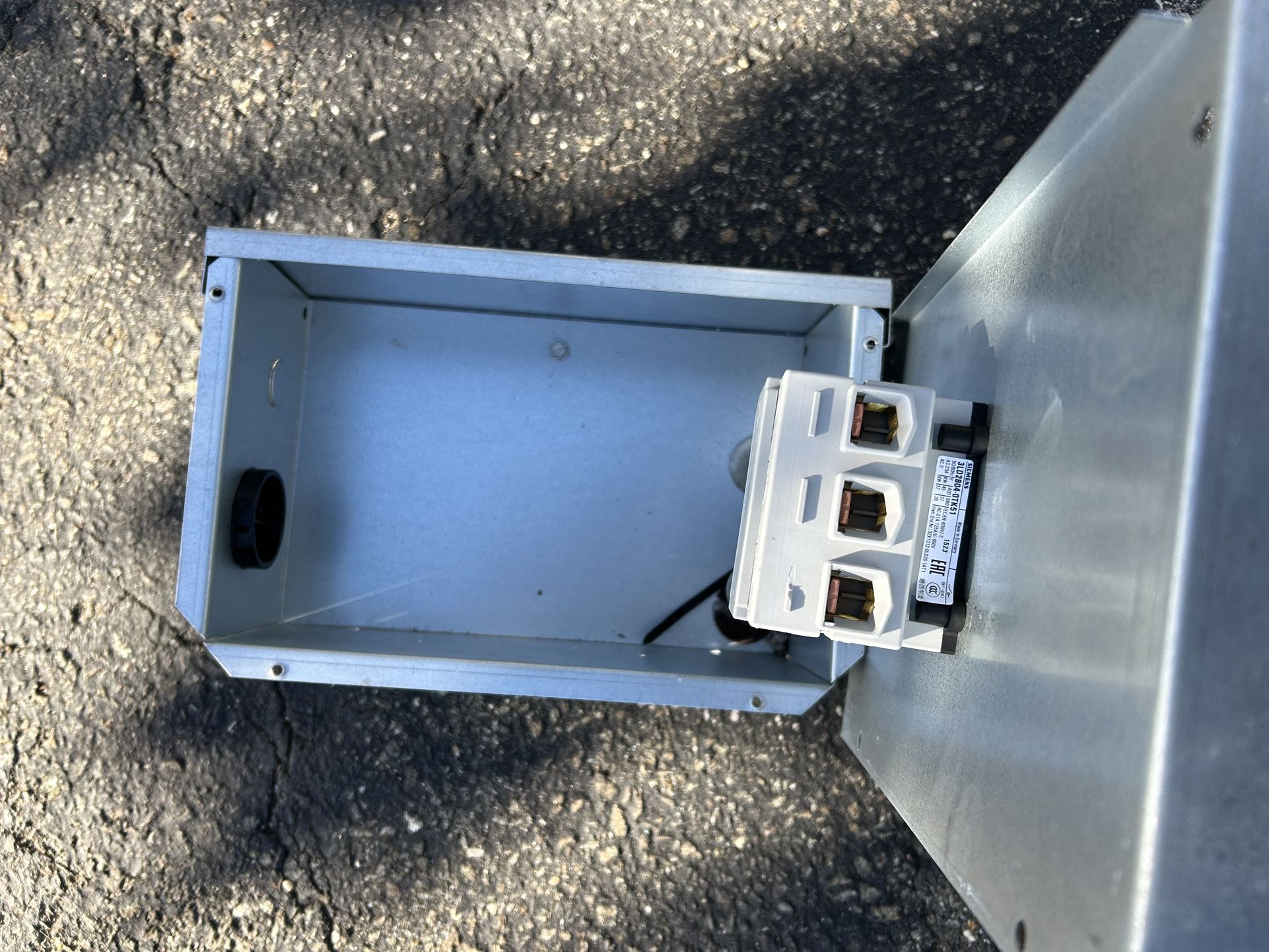 A factory disconnect switch box for a Rheem