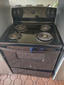 Coil oven range stove
