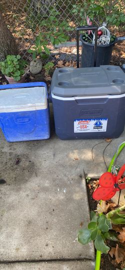 Ice chest one on wheels and a small carry one