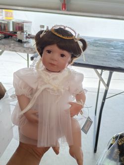 Porcelain doll $ 15