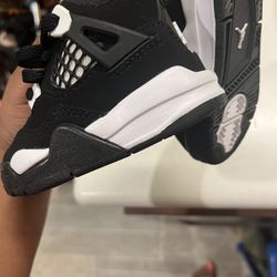 Black And White Jordan 4s 