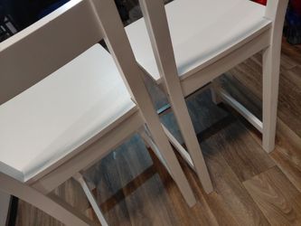IKEA white wood chairs