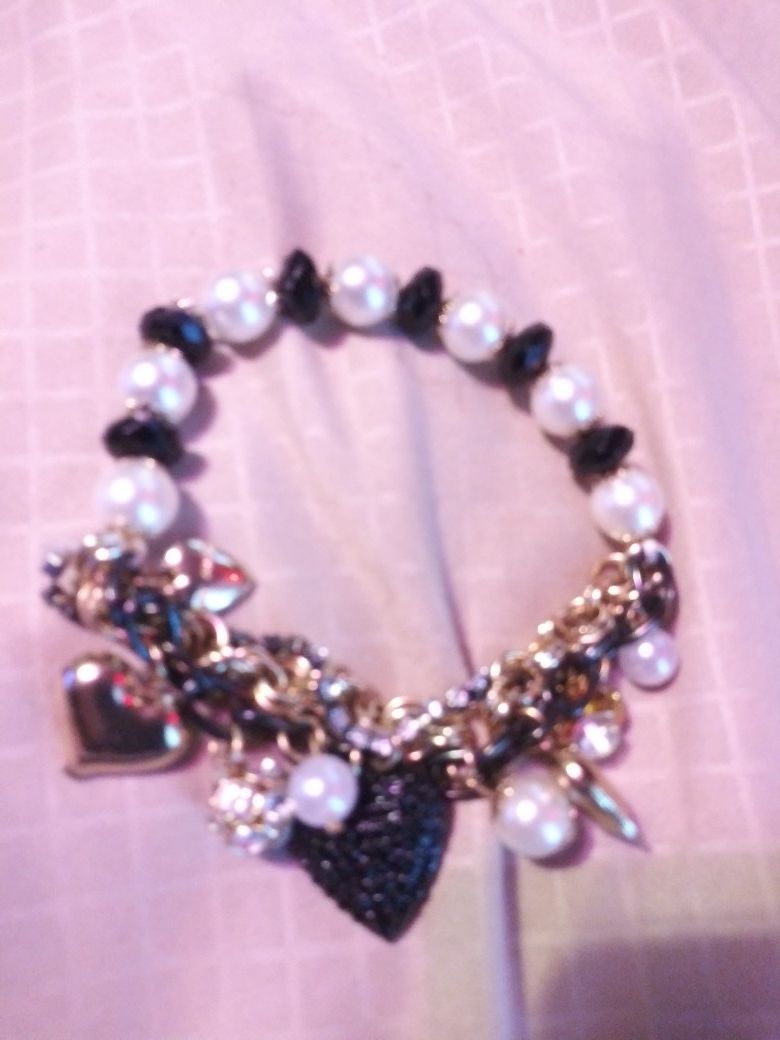Betsey johnson black and white charm brac