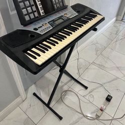 Great Yamaha Keyboard With Stand.  ,comes With Wall Charger ! Works Great 