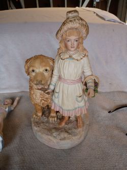Bisque Porcelain Girl and Dog Figurine