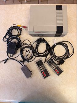 Play station 1 console ( 2 controllers, power adapter, rca cables)