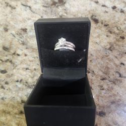 White Gold ring, "14K" containing the cent diamond.