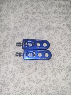 Bullseye chain tensioners