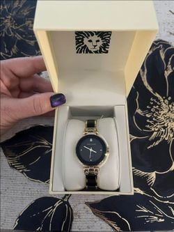 Anne Klein Women's Genuine Diamond Dial Bangle Watch