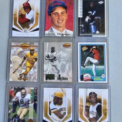 BOX OF SPORTS CARDS IN TOP LOADERS 