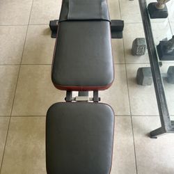 Bench for doing exercises and set of 35lb iron dumbbells