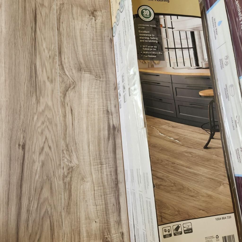 12 New Boxes of Traffic Master Laminate Wood Look Flooring Lakeshore Pecan 24.2 sq. ft. per box. Local Pick Up Only