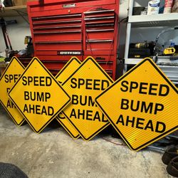 Speed Bump Ahead Signs