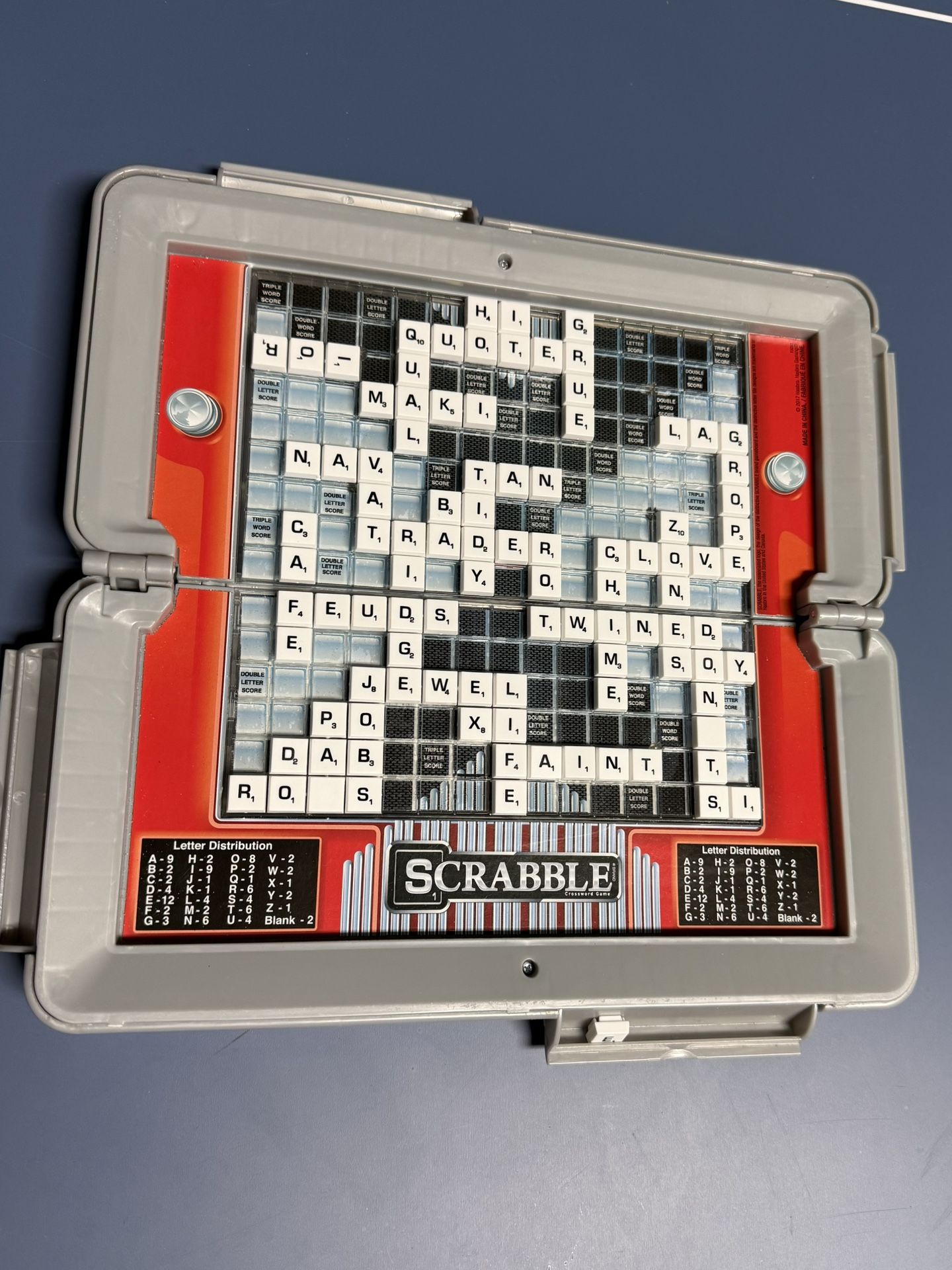 Travel scrabble Portable Gameplay: Offers full Scrabble gameplay within a convenient and sleek portable case, ideal for travel. Pause Functionality: A