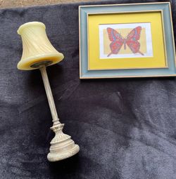 Candle and butterfly framed photo