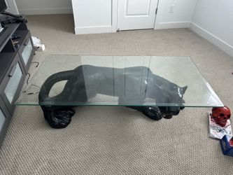 Beautiful Jaguar-style glass top table