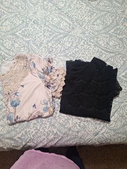 2 ,Ladies Blouses  Black One Is A 18/20  Lane Bryant Brand With Eylet Front And Lace Sleeves  The Other Is X/large . Total Price 6 Dollars 