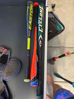 Assortment of used little league and tea ball bats