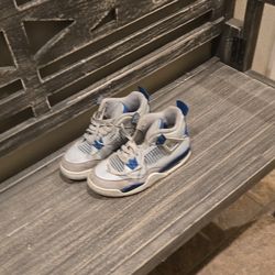 White and Blue Air Jordan 4 Sneakers