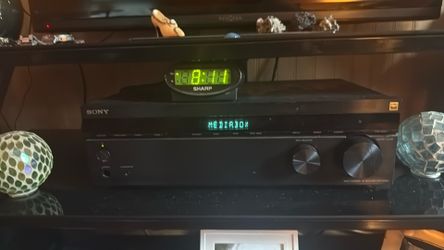Sony 4K HDMI Receiver with 4 Speakers and a powered sub.