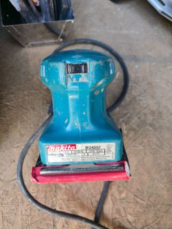 Corded palm sander