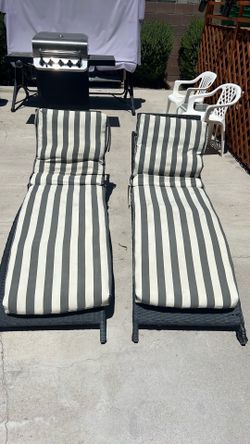 Two chase lounge chairs