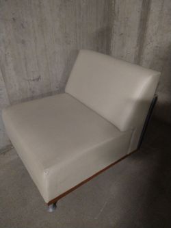 Cream Leather Armless Lounge Chair on Casters