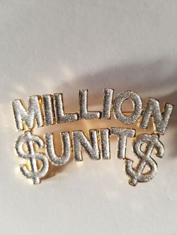 Million Units pin/brooch