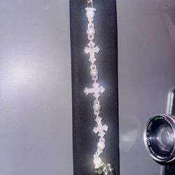 Silver iced out cross ball bracelet
