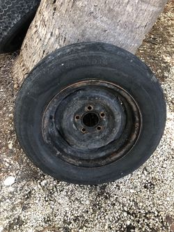 Trailer tire with the rim ST 215/75D 14, used, good for spare tire