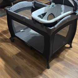 Playard for Babies - Heavy-Duty Steel Frame for Safe Sleep Space, Portable Crib with Changing Table, Locking Wheels, Breathable Mesh