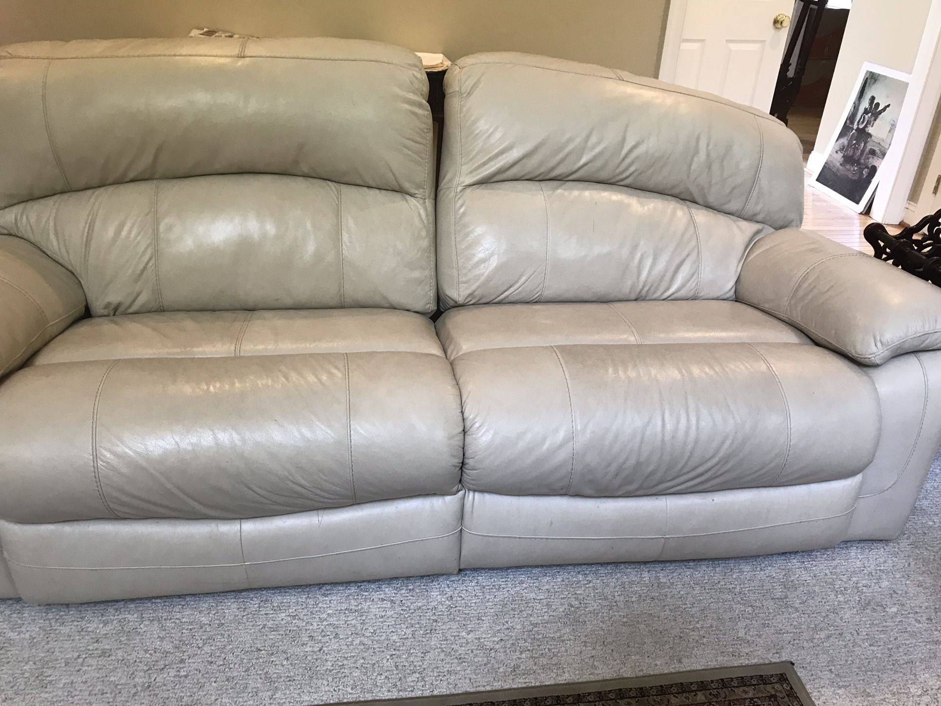 Free!!! Ashley Furniture Leather Reclining Sofa. Frame is broken, but can be repaired. Must be picked up by Monday!!!