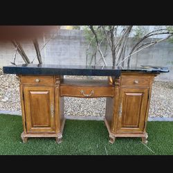 To Cabinet With Drawers In The Black Granite On Top