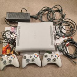 Xbox 360 with controllers and chords