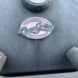 Char-Griller three burner, gas and charcoal grill