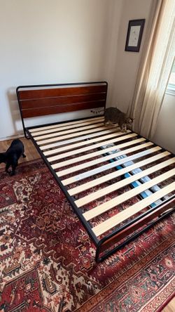 Queen bed frame — metal and wood