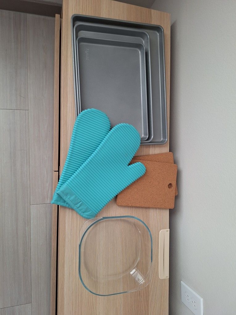 Baking Set - 3-Piece baking pan set, Ikea FÖLJSAM glass baking dish, Ikea cork trivets, and KitchenAid silicone oven mitts