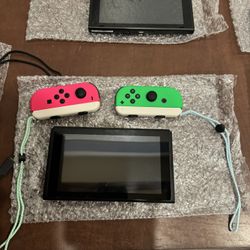 Brand New Green And Pink Nintendo Switch With Wrist Strap