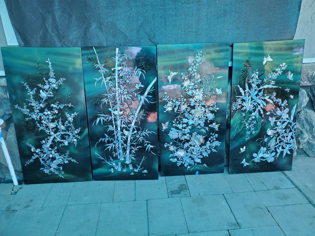 A VIETNAMESE FOUR PANEL MOTHER-OF-PEARL INLAID