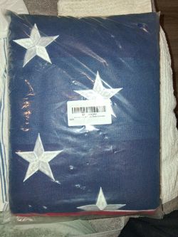 6 Foot./ 10 foot. American Flag brass grammar's new in bag. Embroidered stars.