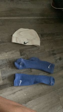 Skull cap and blue Nike socks