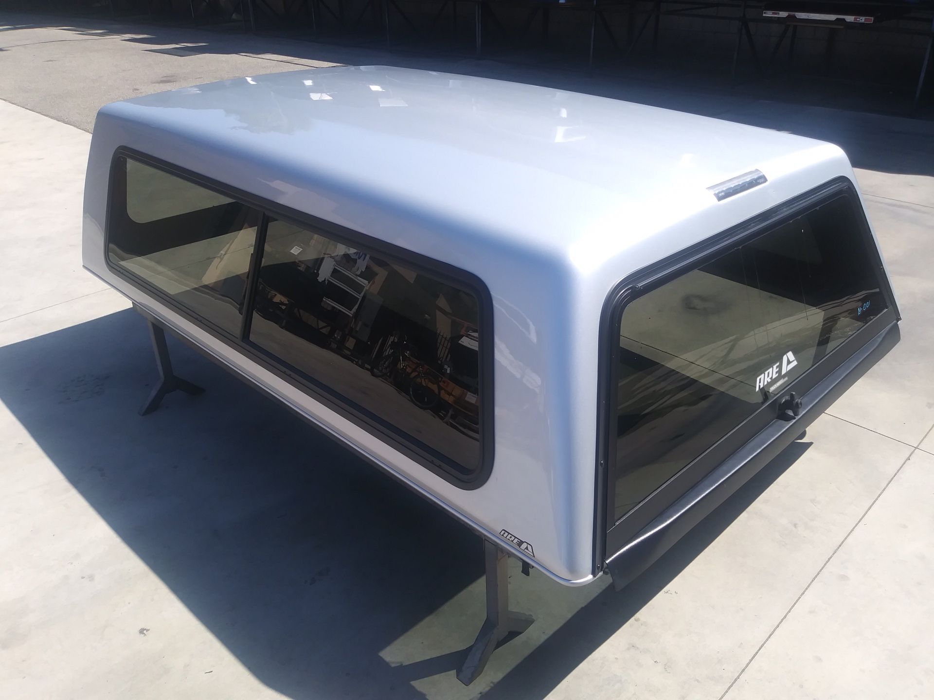 A1-001 Selling Used A.R.E. Camper Shell for Ford