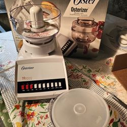 New 10 speed Oster osterizer blender with processor accessories. 