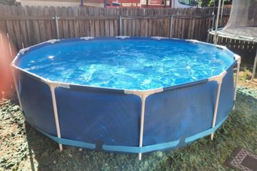 Coleman pool and a large pool pump
