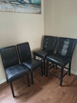 4 black dining chairs