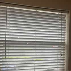 2 white wooden blinds